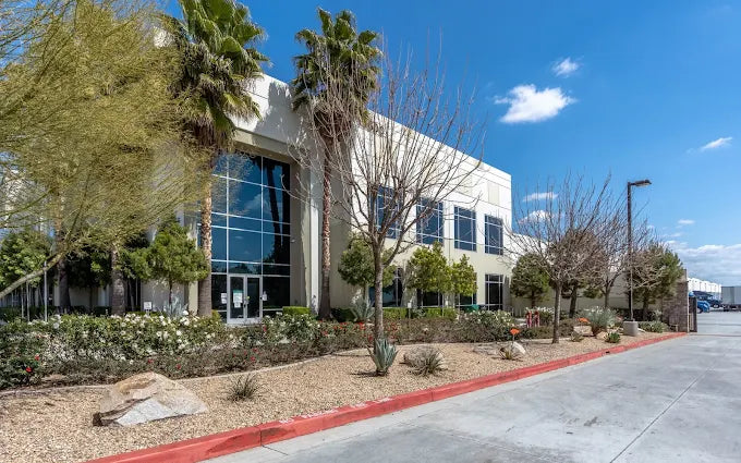 Sideways shot image of the Artext Wholesale office building from the outside.